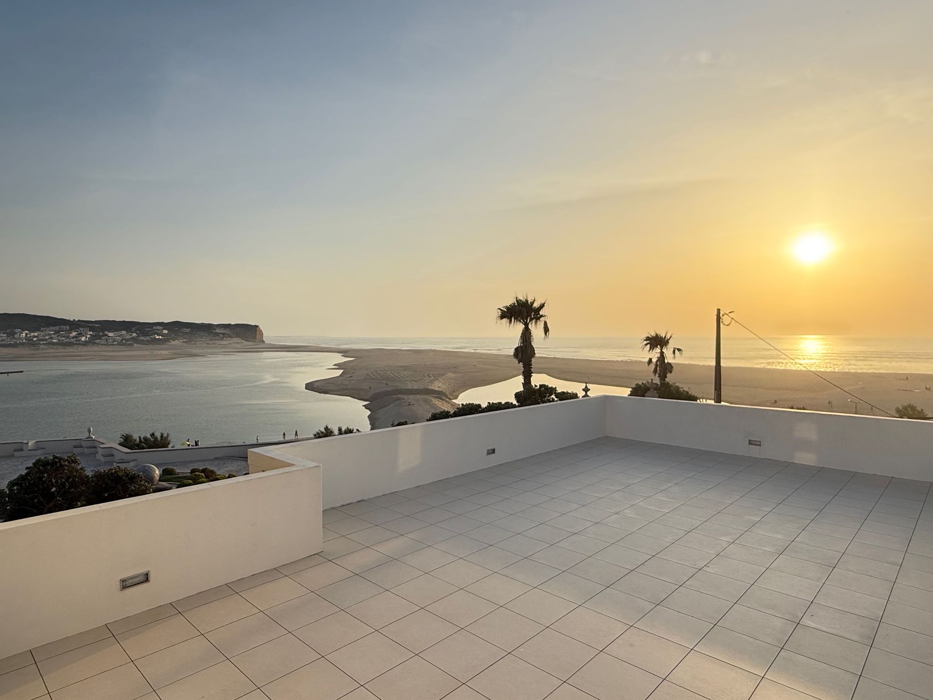 Panoramic view over the Óbidos Lagoon and the ocean from the property