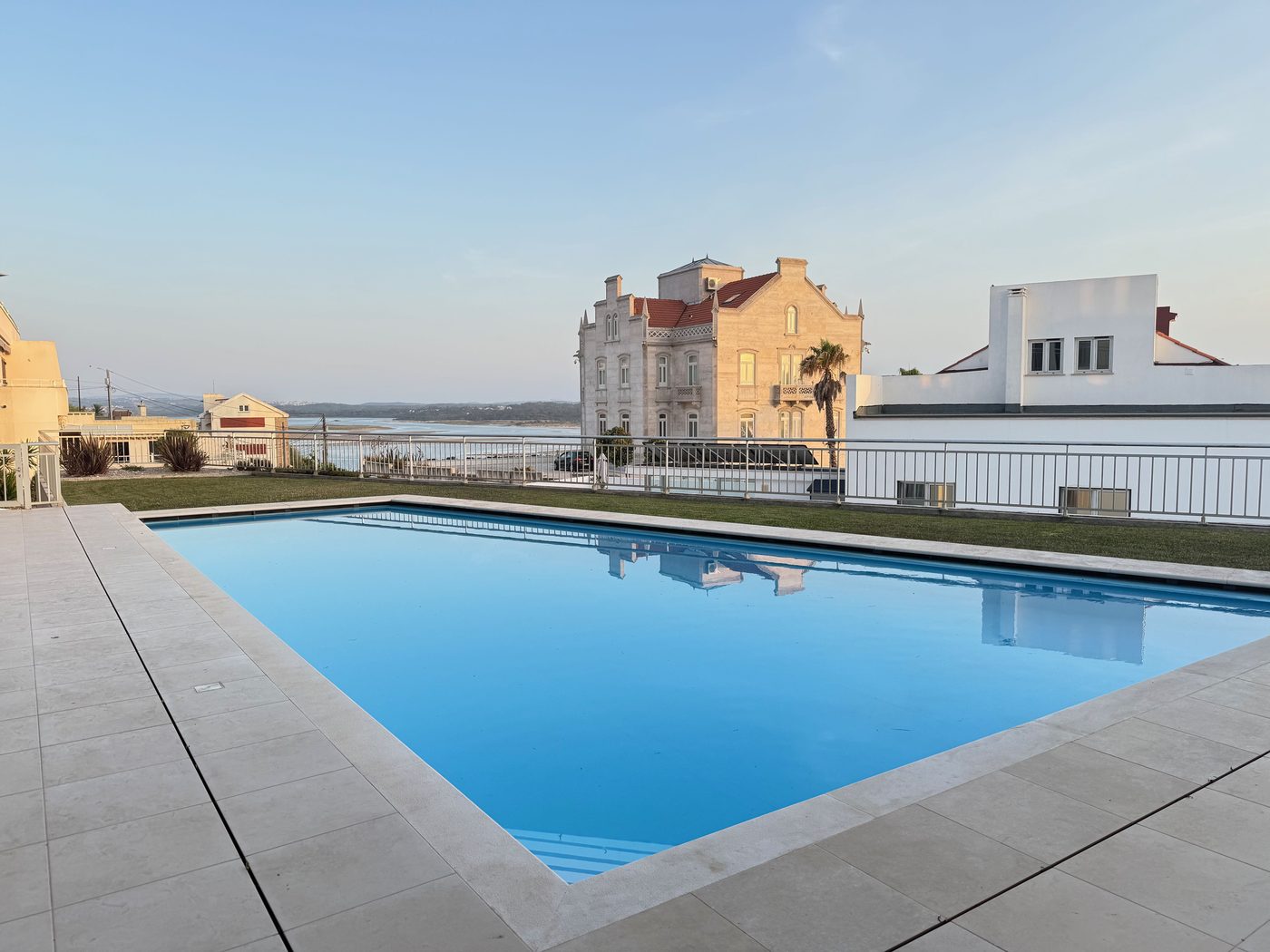Development pool · the neighbouring manor in view