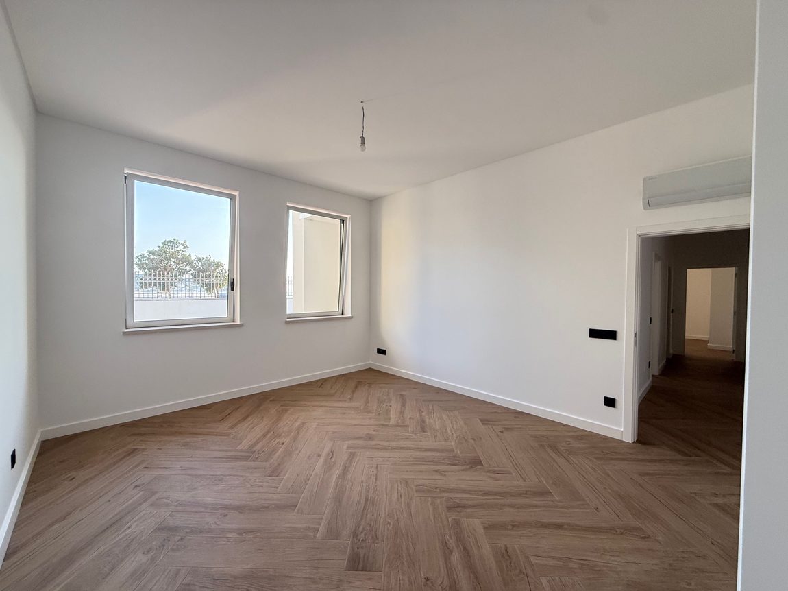 Bedroom · herringbone floor · air conditioning